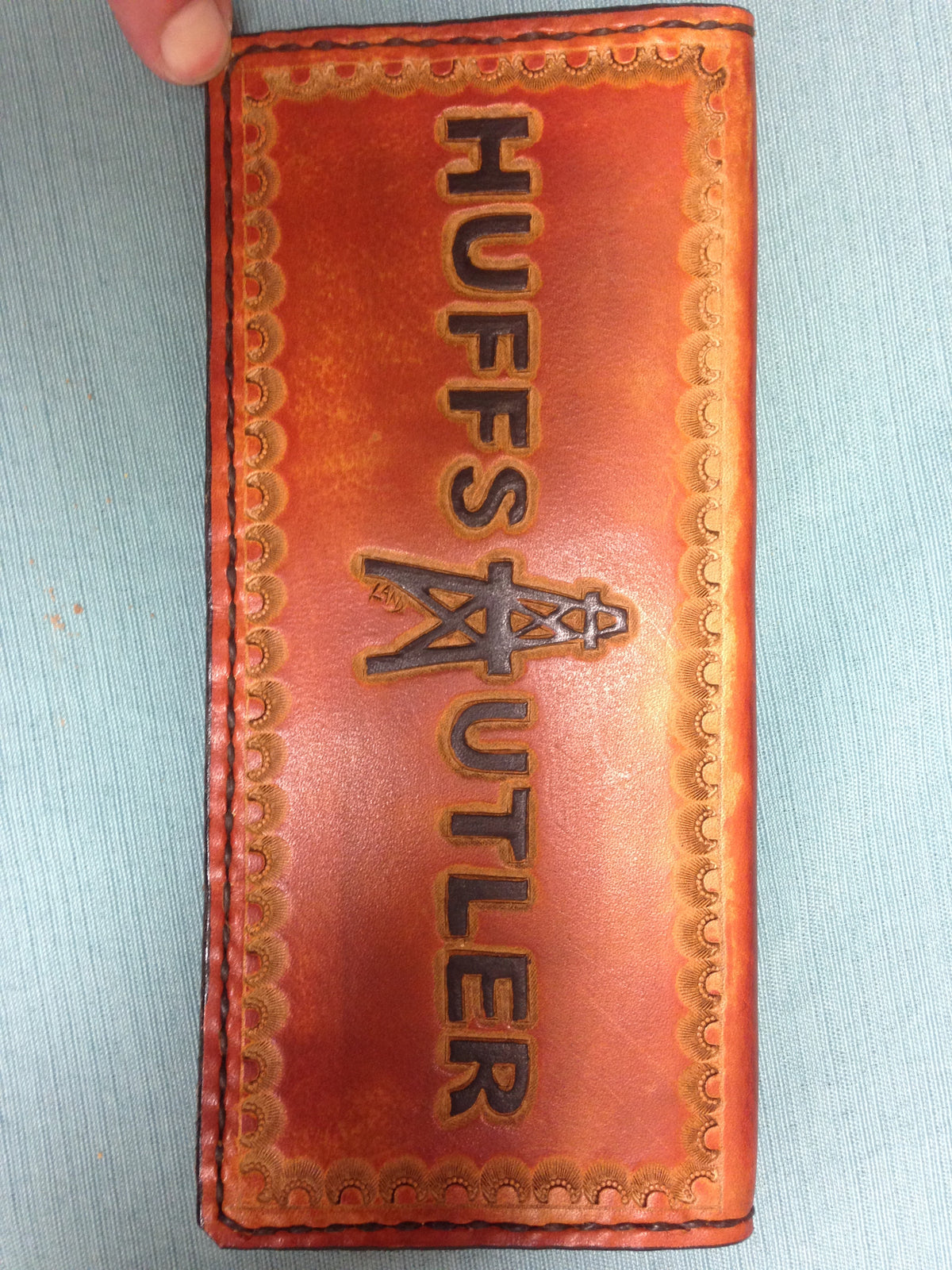 Handmade Custom Leather Items - All Handmade in Texas. Boot Jack, Tally Book, Pistol Case, Holster