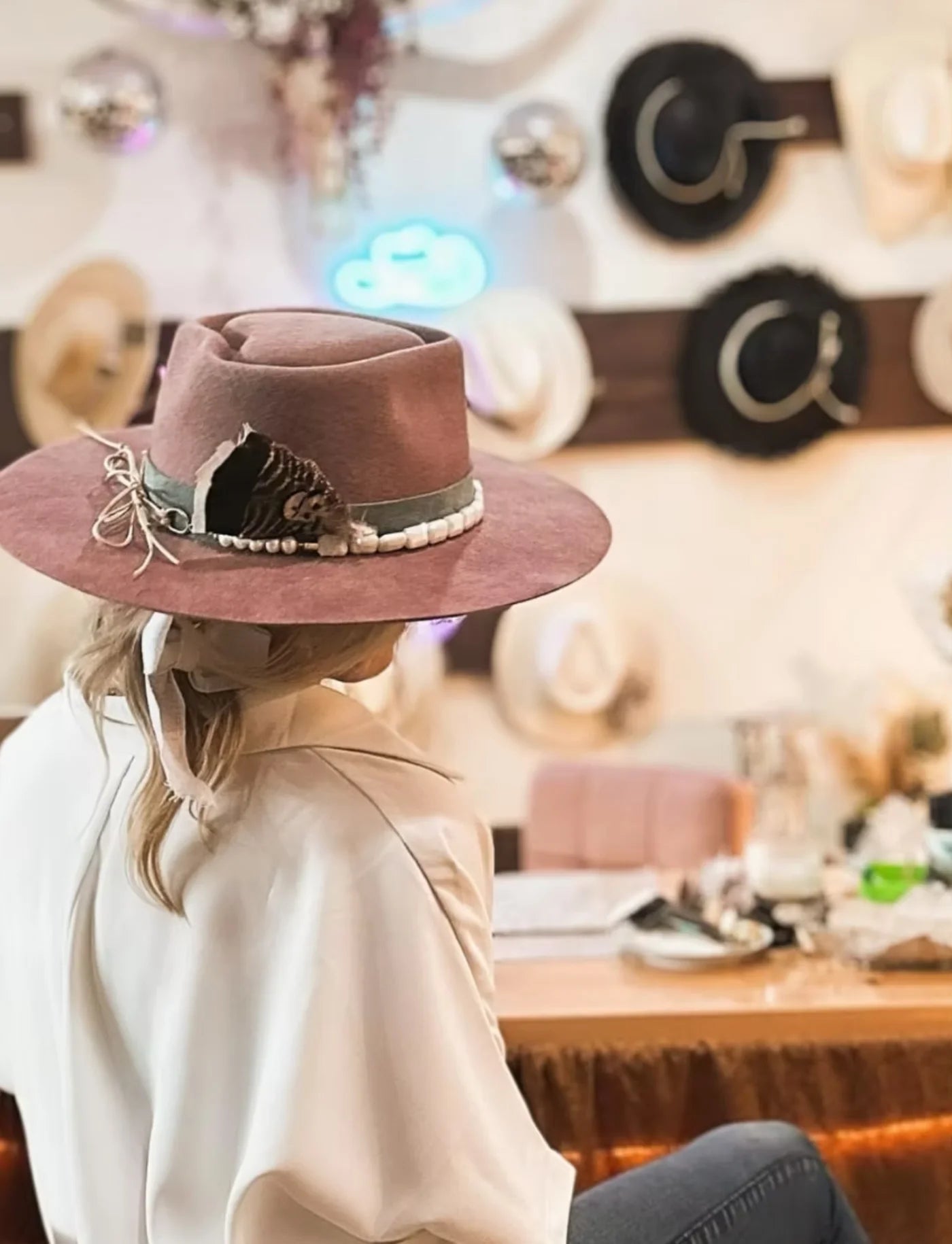 A personalized mauve hat at Republic Hat Bar