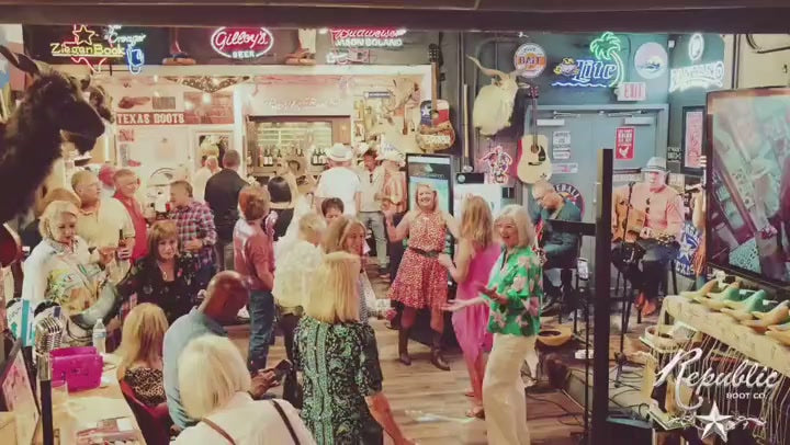 Guests gathering for live music at Republic Boot Co.