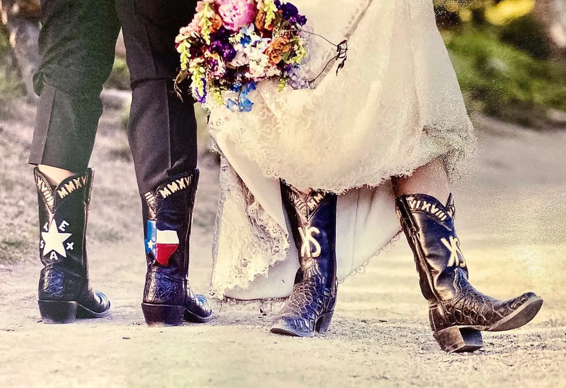 Bride and groom wearing personalized Texas cowboy boots on their wedding day